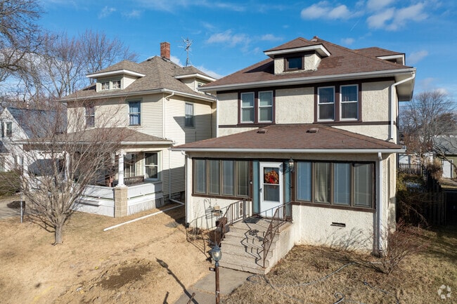 Uptown Moline’s Foursquares stand tall, showcasing timeless charm and care.