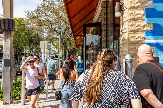 Residents flood the Pineapple Grove Arts District on a beuatiful sunny day.