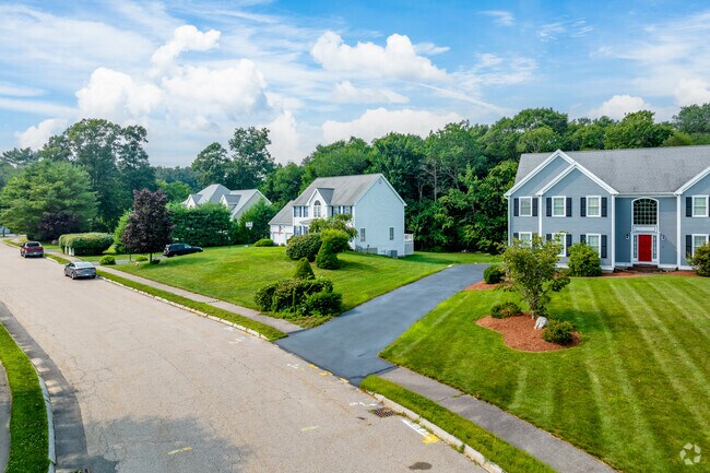 A row of modern colonials on Copper Beach Circle in West Bridgewater.
