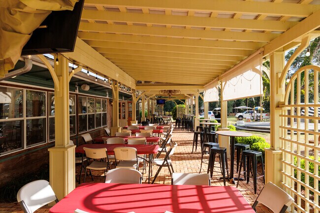 Outdoor seating provides great access to food trucks and a live band at The Hub in Miccosukee.