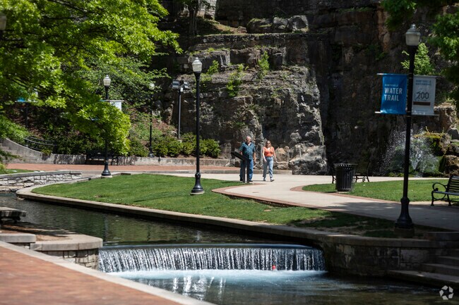 Walk along the abundant nature at Big Springs Park in Huntsville Alabama.