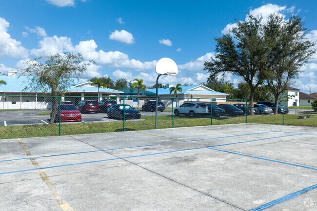 Nicaea Academy of Cape Coral has a basketball court and other outside activities for students.