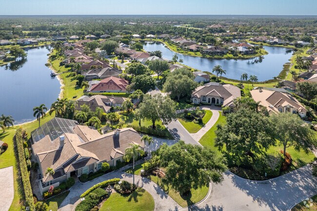 A long lake winds its way through the Longshore Lake community in Naples.