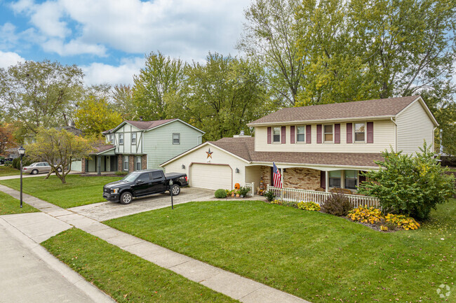 Colonial and split-level homes line the streets of the Oakhurst neighborhood.