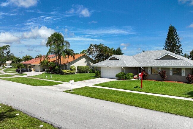 Well manicured lawns and side walks are a must in Sugar Pond Manor neighborhood.