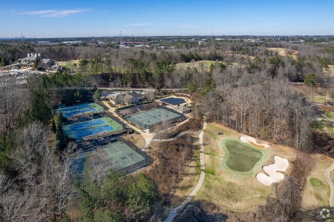 The Smoke Rise Country Club offers a golf course in addition to tennis facilities and a pool.