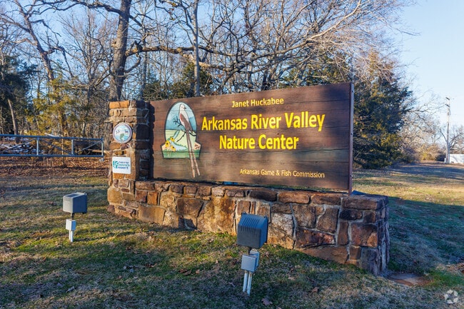 The Janet Huckabee Nature Center sign welcomes visitors from all over.