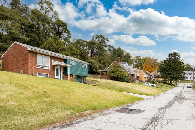 The rows of houses in Braddock Hills showcase homes up on hills.