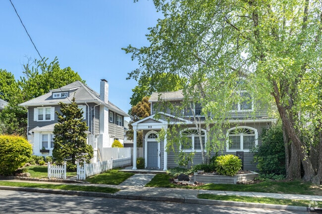 In Hewlett Neck, homes often have rich foliage in their yards.