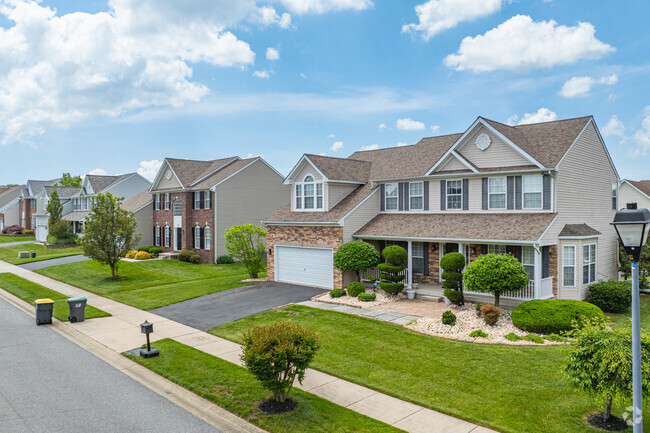 Large Traditional and Colonial style homes in quiet neighborhoods are common in Bear.