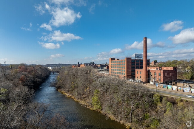The Eau Claire River runs adjacent to Banbury Place, an industrial landmark converted to retail.