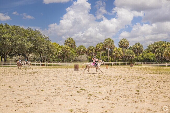 Sunshine Ranches Equestrian Park features trails and a ring for local riders.