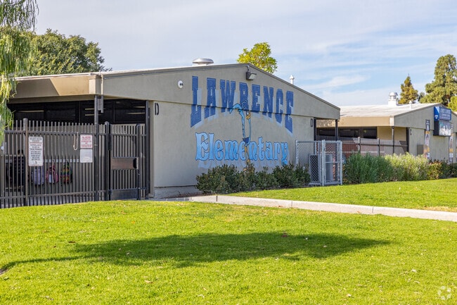 Teachers encourage learning at Lawrence Elementary School.