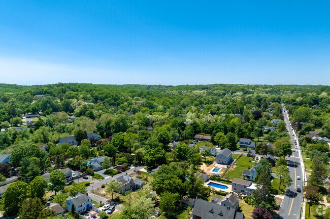 Most homes in Navesink have private lots with mature trees.