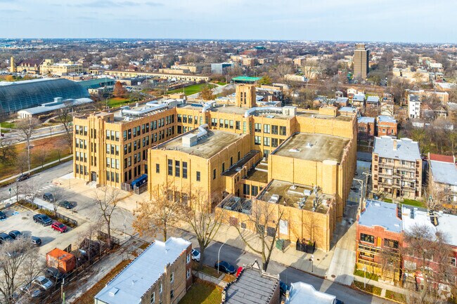 Raby High School features a design of yellow brick in a historic building.