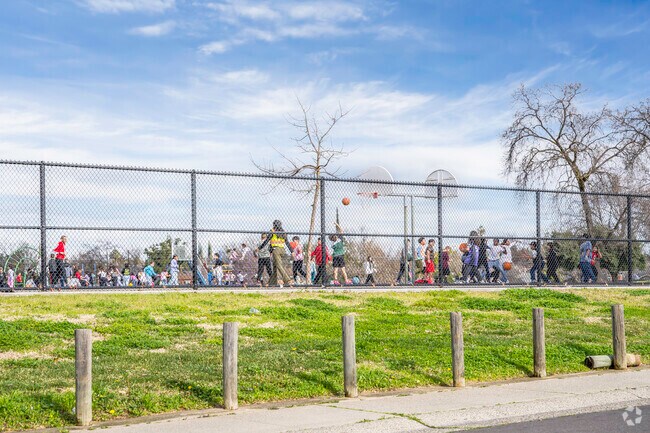 The kids at Pioneer Elementary School are enjoying a warm afternoon recess in Foothill Farms.