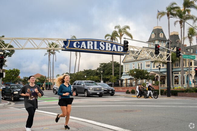 The iconic Carlsbad sign along the Coast Highway warmly welcomes visitors near South Beach.