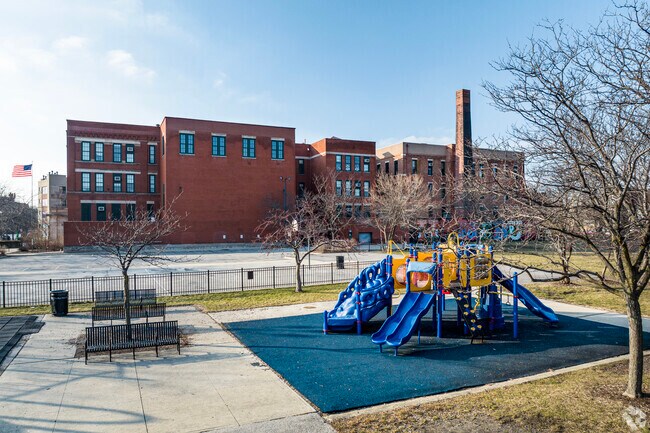 Otis Elementary School has a modern playground and basketball courts for students to use.
