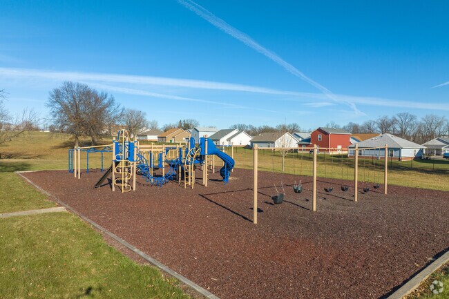 Kids flock to the playground at Forest Park after school.