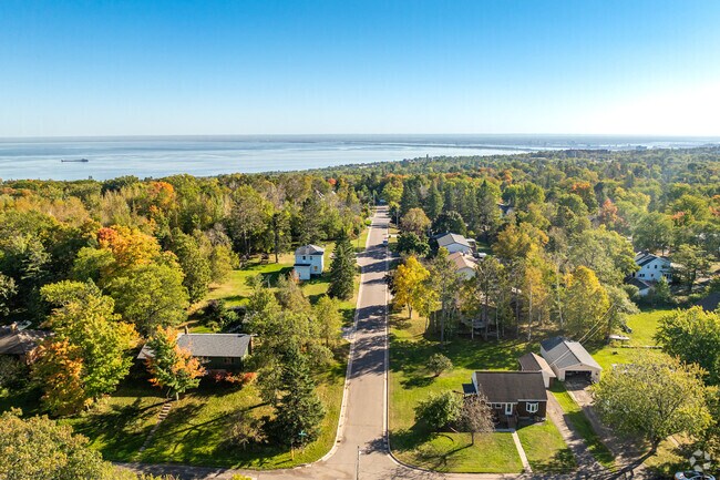 The Hunter Park neighborhood offers homes on lots with mature trees.