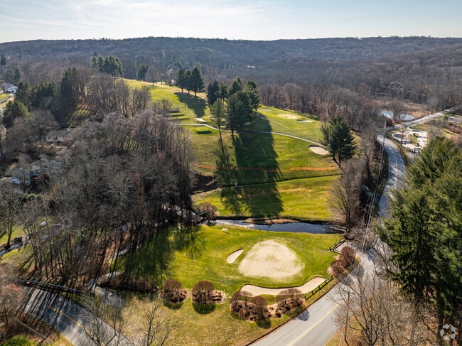 Newtown Country Club offers a scenic 9-hole golf course and a welcoming atmosphere.