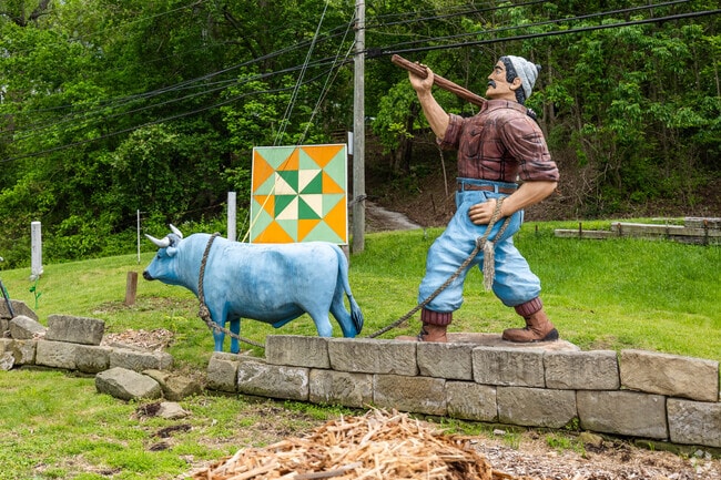 In Institute, a statue of Paul Bunyan marks the folk tale of his boot print in the Ohio Valley.