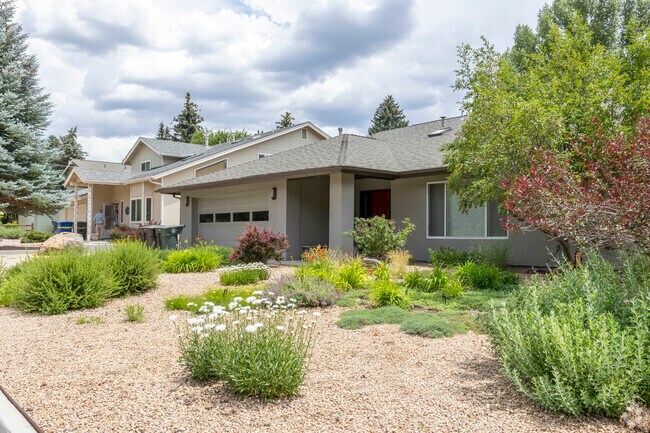 Some newer homes in Coconino Estates have low water landscaping.