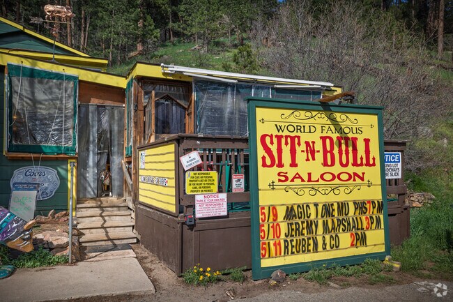 Stop in for a drink and good local eats at Sit-N-Bull Saloon in Indian Hills.