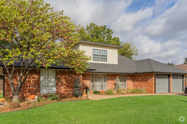 Brick and stone ranch homes from the 1960s are common in Camelot Bel-Aire.