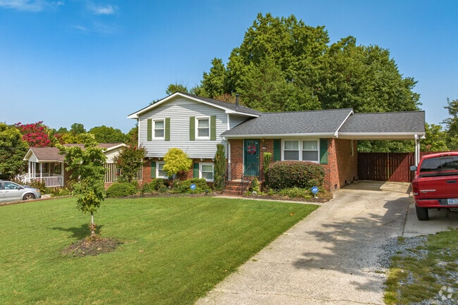 Split-Level homes in Random Woods nestle under mature trees.