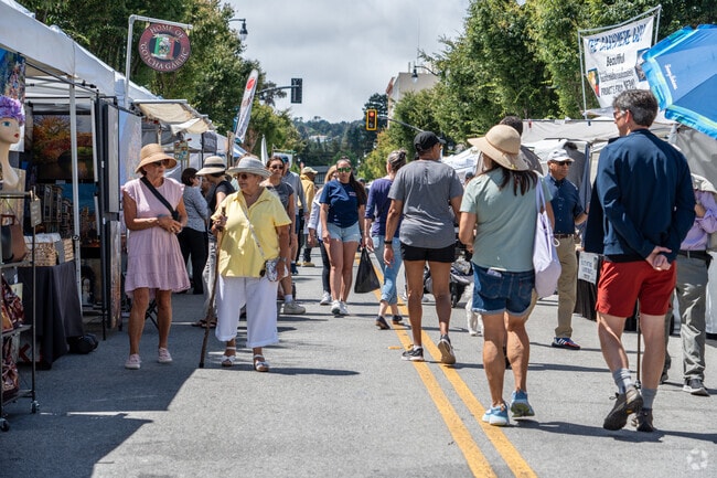 Shoppers browse unique crafts and jewelry at Burlingame on the Avenue 2024.