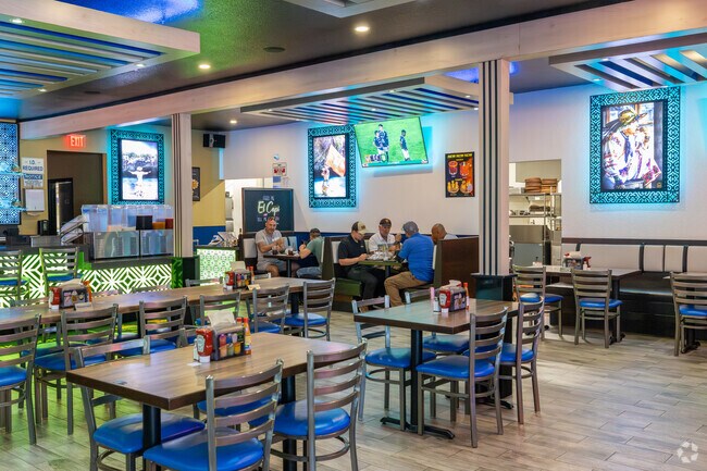 Grab a plate of fresh seafood at El Capi, a local favorite.
