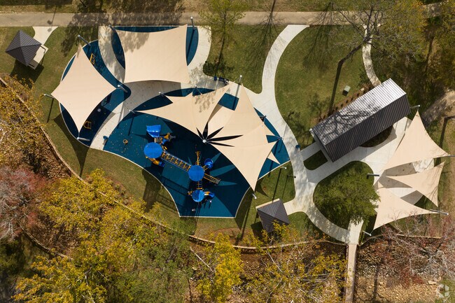 Pearl City Park, newly renovated, boasts a spacious playground for recreation and enjoyment.