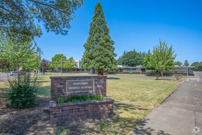 Whitford Middle School signage welcomes you to the student entrance.