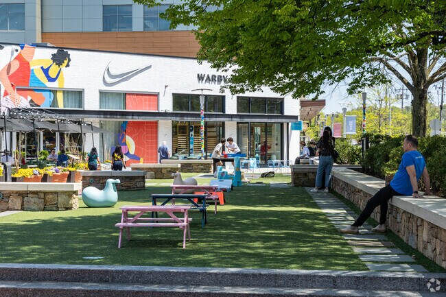 The Streets offers great shopping and spaces to relax near South Brookline.