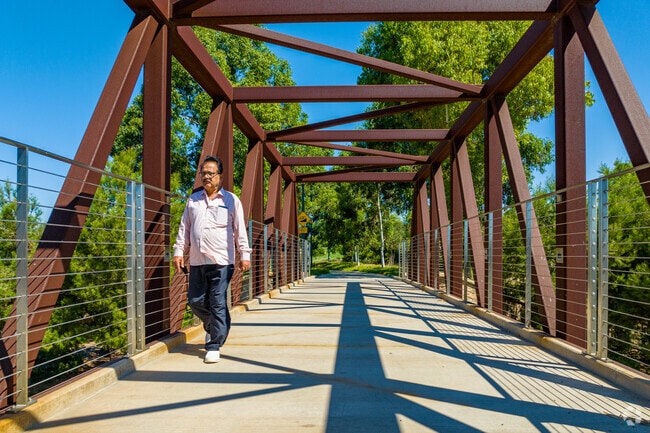 Jeffery Open Trail near Cypress Village features a popular bridge for walking.