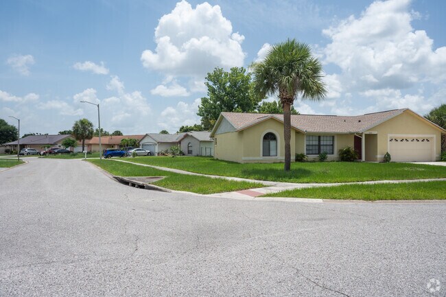 Vibrant ranch-style homes line the peaceful streets of Peppermill.