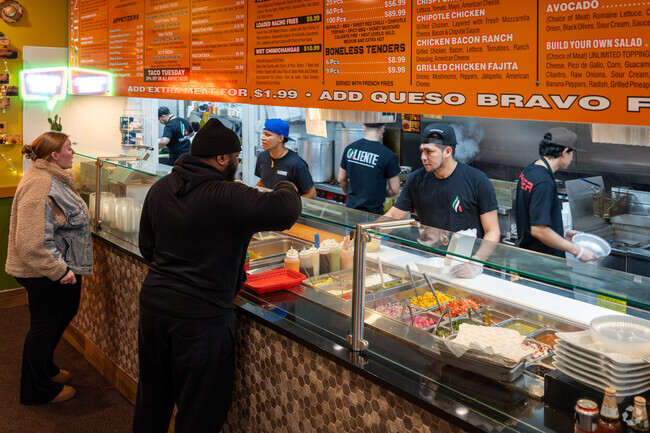Spice up your day with authentic Mexican tacos at Caliente Reservoir in Arlington, RI.