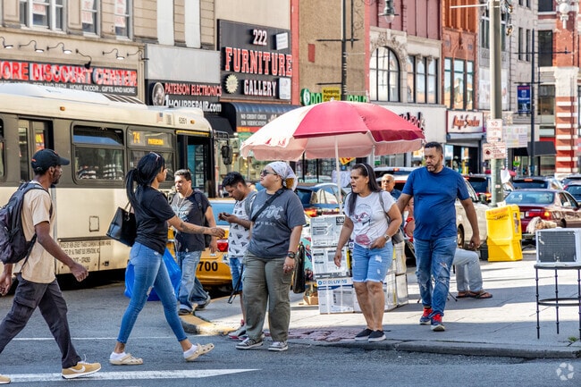 Downtown Paterson is just minutes from Totowa Section with shops, buses, and busy sidewalks.