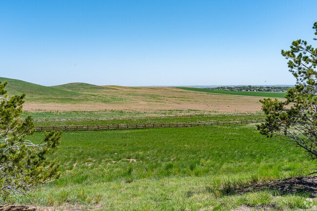 Explore outdoor beauty in The Villages at Riverdale with trails and green space.