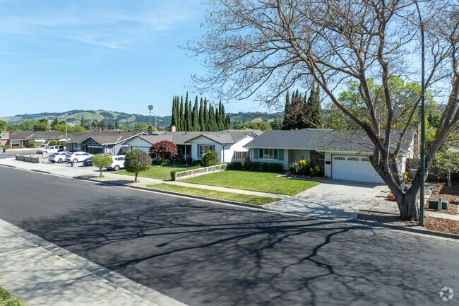 Ranch-style homes in Cahalan boast manicured lawns and scenic views of the nearby rolling hills.