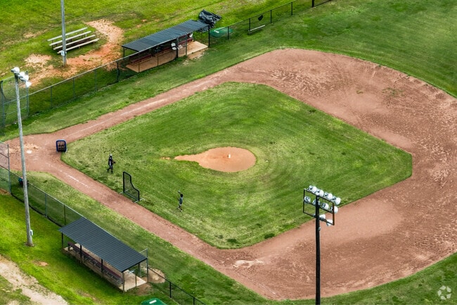 Baseball fields and spacious green spaces are offered at Praise Academy.