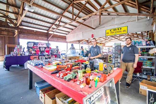 Barnyard Flea Market vendors sell their antiques and goods to Oak Grove residents.