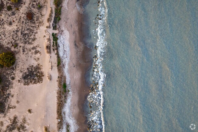 Kenosha Sand Dunes offers an amazing natural beach just minutes from the Lance neighborhood.