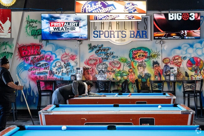 Enjoy a friendly game of pool at Charlie's Sports Bar and Grill.