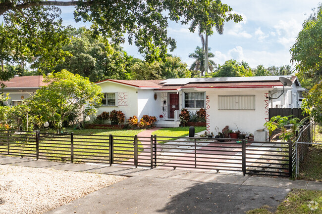 Enjoy living in a cross-gabled ranch style home in North Miami.