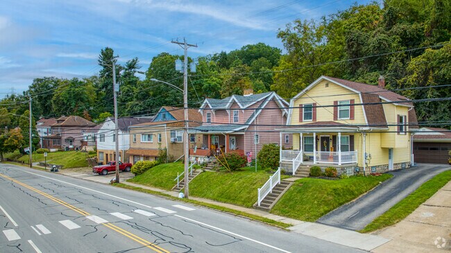 A row of homes built in the 1920s sits proudly in Hopewell Township along the Ohio River.
