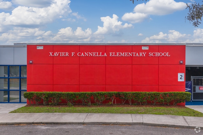 Cannella Elementary School greets students with its bold red facade.