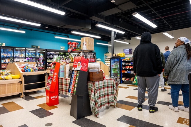 Shoppers take advantage of the newly opened Pontiac Street Market in Adams Township.