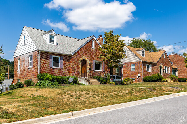 Quaint rows of Tudor style homes are found in the charming neighborhood of South Four Corners.
